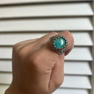 Silver ring with blue stone